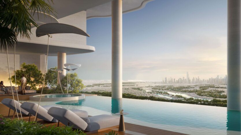 The luxurious infinity pool on the roof of Alta View is equipped with sun loungers, modern décor, and lush vegetation, offering views of the city and river at sunset. Tall columns and large windows frame the breathtaking panorama of Alta View.