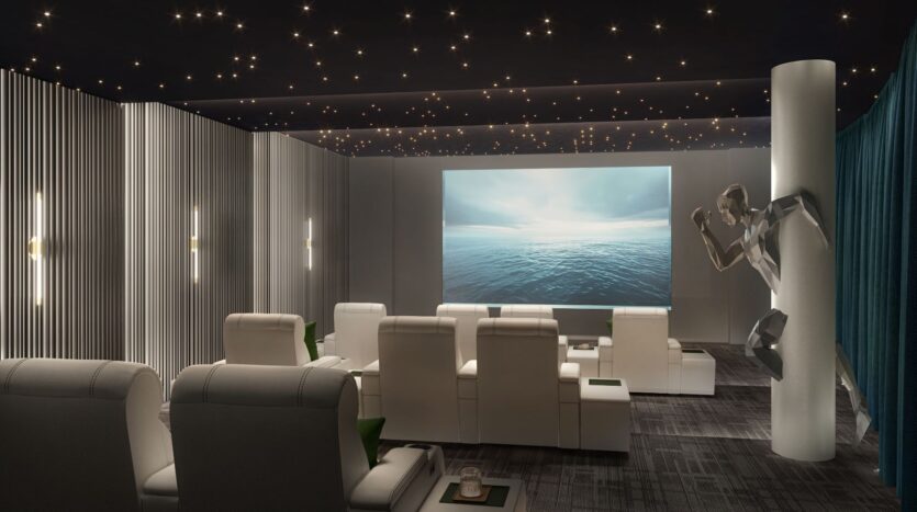 Modern home theater with white reclining chairs facing a large screen displaying an ocean scene; the ceiling is lit by star-shaped lights and a sculptural figure—Bella by Passo—seems to emerge from the wall on the right.