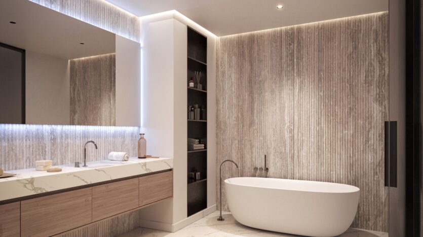Modern bathroom with freestanding oval bathtub, Bella by Passo marble vanity with two sinks, wall-mounted faucets, large mirror, open shelves, and textured wall panels, softly lit by recessed and accent lighting.