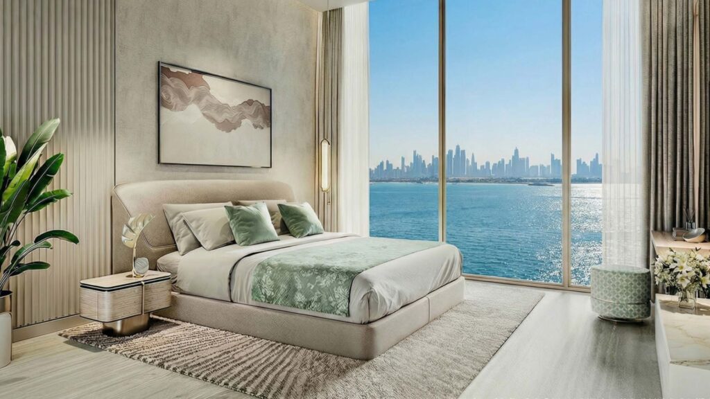 A modern bedroom with a large bed, green accents, and abstract artwork on the walls. Floor-to-ceiling windows reveal the stunning skyline of Flora Bay across the water. Sunlight fills this bright and elegant room.