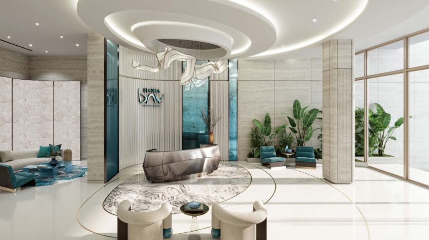 The modern and luxurious reception area of the Flora Bay SPA features an elegant metal desk, abstract ceiling light, plush seating, lush green plants, marble floors, and floor-to-ceiling windows that flood the space with natural light.