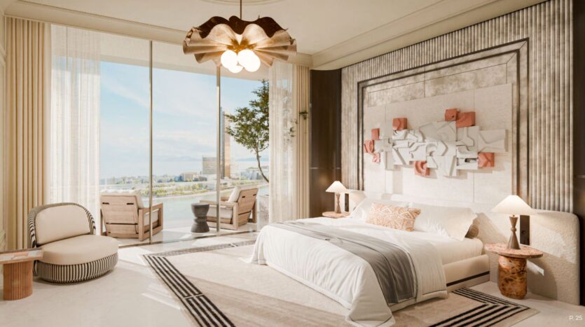 La chambre moderne et lumineuse du Château est dotée d'un grand lit, d'un décor neutre, d'œuvres d'art murales abstraites, d'un mobilier en bois clair et de fenêtres allant du sol au plafond et s'ouvrant sur un balcon avec vue sur l'eau et des sièges extérieurs.