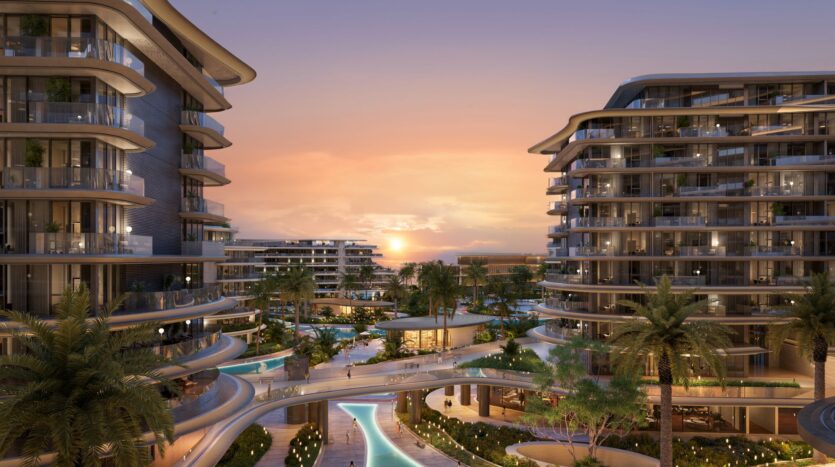 Modern buildings with curved balconies surround Meriva's lush gardens, palm trees, and winding pools. Walkways connect the spaces while a warm sunset glows on the horizon, creating a serene and luxurious atmosphere.