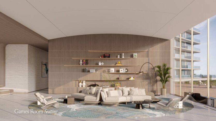 A modern and spacious living room with curved Meriva wood walls, open shelving, neutral sectional sofas, a large rug, a floor lamp, and large windows offering views of a terrace and the ocean beyond. The text reads: "Games Room Seating."