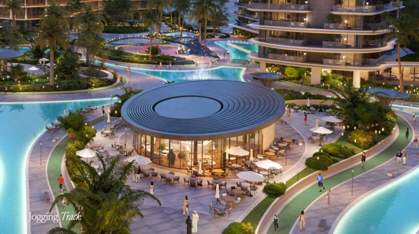 A modern circular Meriva pavilion with outdoor seating is surrounded by palm trees, a jogging track, and a winding blue swimming pool in a luxurious resort setting where people stroll and relax.