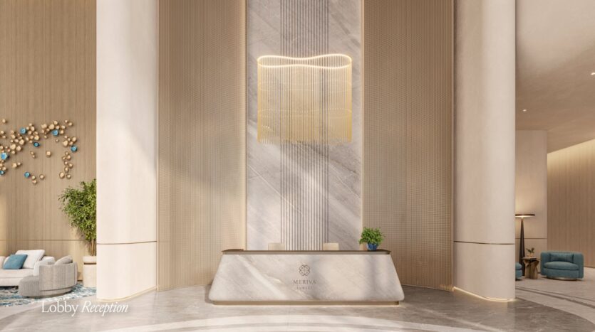 Modern and elegant reception area at the Meriva Hotel, featuring a marble desk, decorative lighting above, and neutral-colored walls. There are plants on the desk, lounge chairs to the left, and the text "Lobby Reception" in the corner.