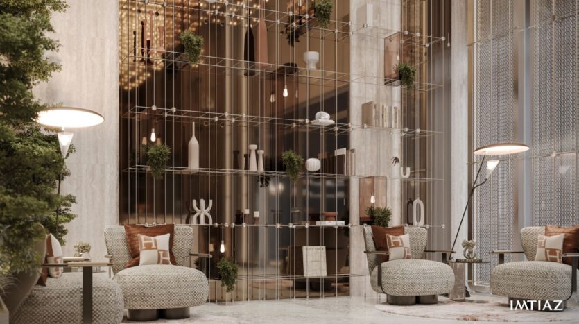 A modern and elegant living room in Sea Cliff with plush chairs, round tables, tall floor lamps, greenery, and a large open metal shelf displaying decorative objects, all in neutral tones and with warm lighting.