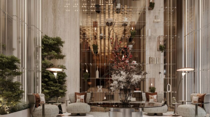 Entrance hall of a luxurious hotel in Sea Cliff with high ceilings, modern chandeliers, lush green plants, elegant seating, and a central round table adorned with a large floral arrangement. Geometric shelves decorate the high marble walls.