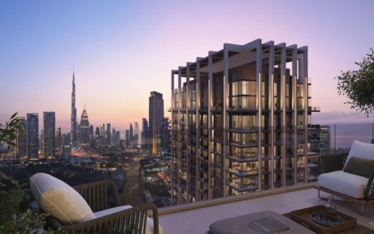 Modern high-rise building with floor-to-ceiling windows at sunset, city skyline with illuminated skyscrapers in the background, and outdoor terrace with plants in the foreground at The Residences DIFC.