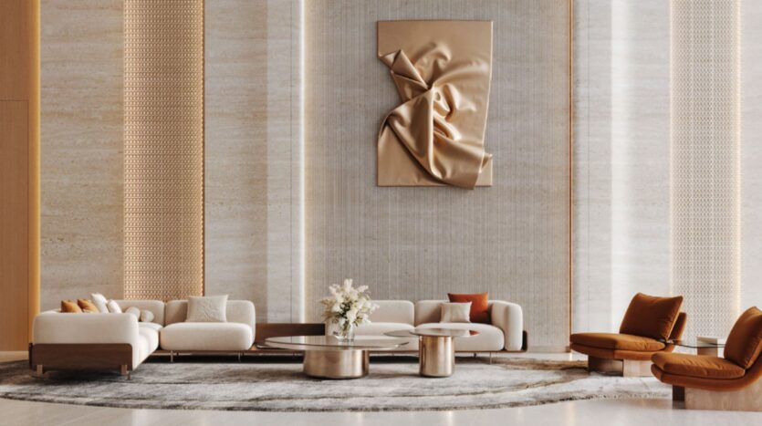 A modern and elegant living room featuring cream-colored sofas, brown chairs, round coffee tables, a gray rug, and a sculptural golden Skyflame wall art piece against tall, textured walls. A floral centerpiece adorns the table.