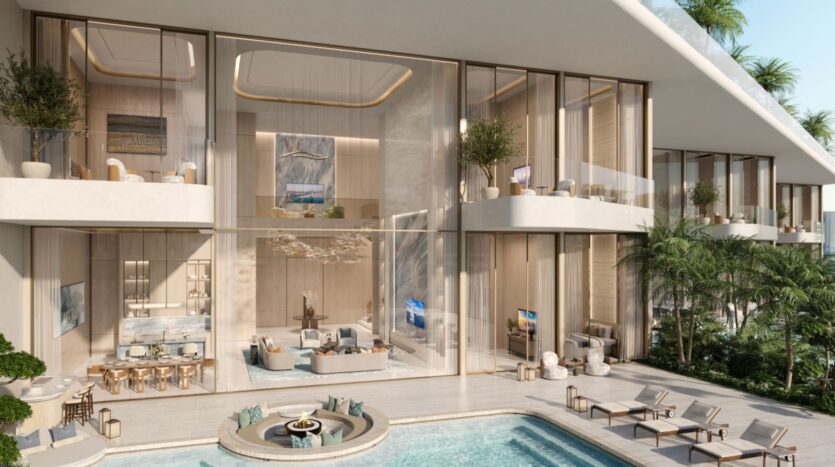 Esta moderna villa de lujo del complejo Amali cuenta con amplios ventanales que van del suelo al techo, balcones abiertos, una elegante decoración interior y una piscina exterior rodeada de tumbonas y plantas tropicales.