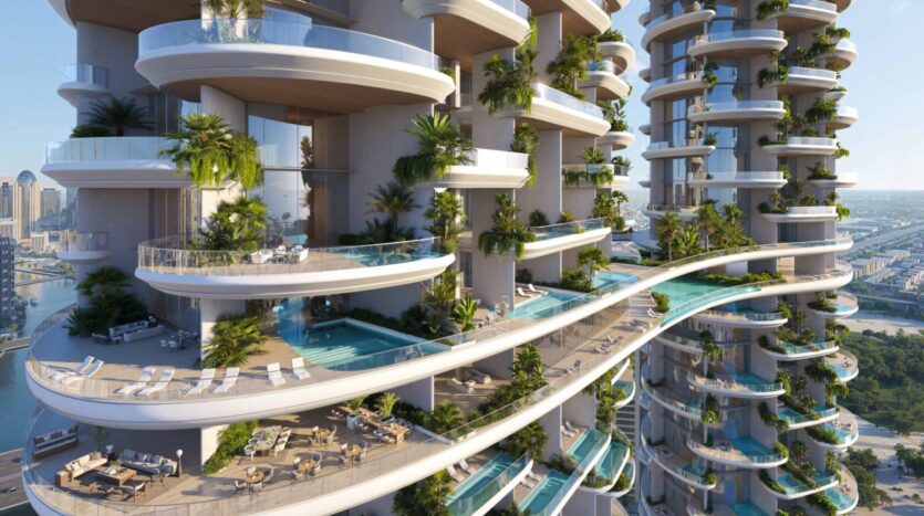 Amali Residences es un lujoso rascacielos con balcones curvos, piscinas privadas, zonas de descanso y abundante vegetación, desde donde se divisa el paisaje urbano y los canales en los días soleados.