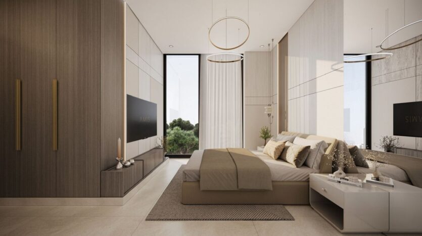 A modern bedroom in Derby Heights featuring a king-size bed, neutral bedding, a built-in wardrobe, a television, minimalist decor, lighting fixtures, nightstands, and a large window with sheer curtains that let in natural light.