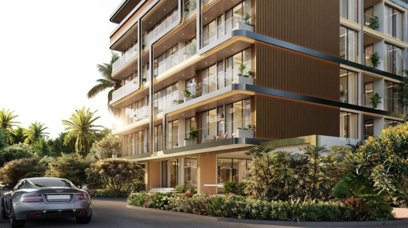A modern multi-story building with glass balconies, surrounded by lush greenery and palm trees; a luxury car is parked near the entrance to Derby Heights, with sunlight filtering through the scene.