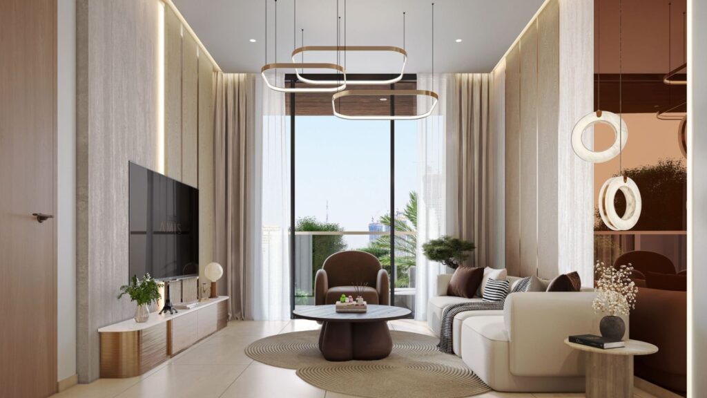 The modern living room at Derby Heights features neutral tones, a large window, contemporary furniture, a circular rug, a wall-mounted TV, geometric light fixtures, and natural light streaming in, with plants visible outside.