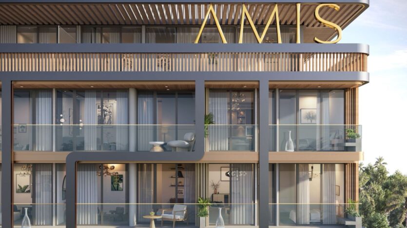 The modern Derby Heights apartment building features large glass balconies, wood and metal accents, outdoor furniture, and lush greenery. The letters "AMS" are displayed in a striking gold font at the top of the building.