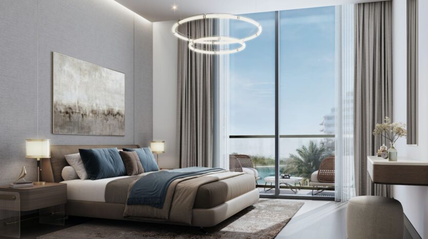 A modern bedroom at River Cove Residences featuring a king-size bed, neutral tones, touches of blue, abstract wall art, two nightstands with lamps, floor-to-ceiling windows, sheer curtains, and a balcony overlooking lush greenery.