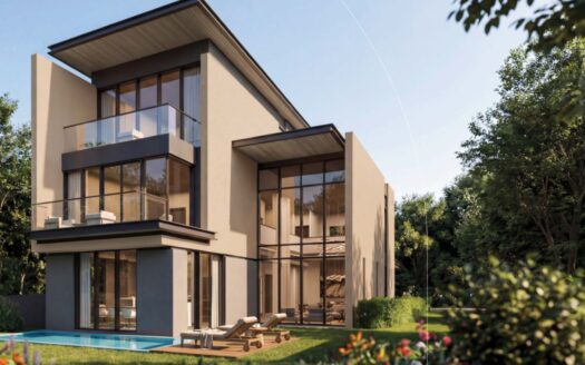 Moderna casa a tre piani nel complesso The Orchard by Sobha, con ampie vetrate e balconi, circondata da una vegetazione rigogliosa e da un prato ben curato, con una piccola piscina e sedie a sdraio nel giardino sul retro nelle giornate di sole.