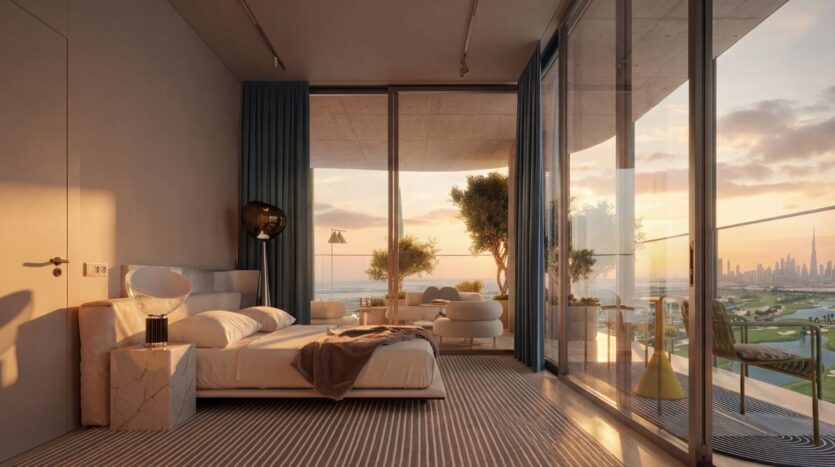 Cette chambre moderne de la Wow Tower est dotée de fenêtres allant du sol au plafond et s'ouvrant sur un balcon offrant une vue imprenable sur la ville au coucher du soleil. La chambre dispose d'un lit, de sièges confortables et d'un décor minimaliste dans des tons neutres.