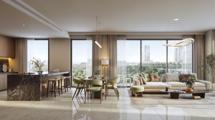 L'espace de vie moderne et ouvert des résidences Rotana comprend de grandes fenêtres, une cuisine avec un îlot en marbre et des tabourets de bar, un coin repas avec des chaises vertes, et un coin salon confortable avec un canapé et des vues sur le paysage urbain.