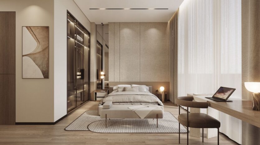 Une chambre à coucher moderne et minimaliste aux tons neutres comprend un lit double, de grandes fenêtres avec des rideaux transparents, un bureau avec un ordinateur portable et une lampe, des œuvres d'art murales abstraites, un éclairage doux, et est élégamment décorée avec Tivanno by AYS.