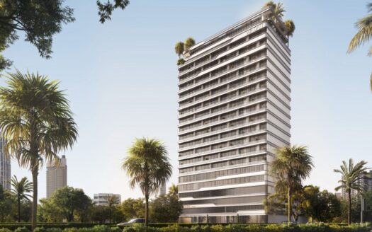 Tresora by Wadan est un immeuble moderne de grande hauteur avec des lignes horizontales blanches et des balcons, entouré de palmiers et de verdure sous un ciel bleu clair. D'autres bâtiments sont visibles en arrière-plan.