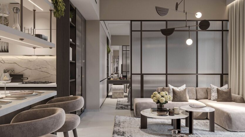 Un salon et une cuisine modernes et ouverts avec des tons neutres, des sièges en peluche, des touches de marbre, un décor minimaliste, des tables basses rondes, un luminaire suspendu et une grande fenêtre avec des rideaux diaphanes - faites l'expérience de l'élégance avec Tresora by Wadan.