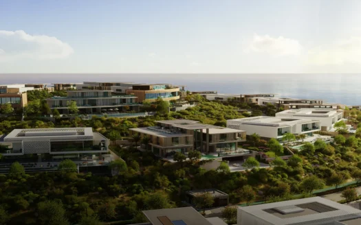 Les villas et immeubles modernes et luxueux de Modon Properties sont entourés d'une végétation luxuriante sur une colline surplombant l'océan. L'architecture se caractérise par des lignes épurées et de grandes fenêtres - découvrez tout savoir sur Modon Properties et ses conceptions harmonieuses.