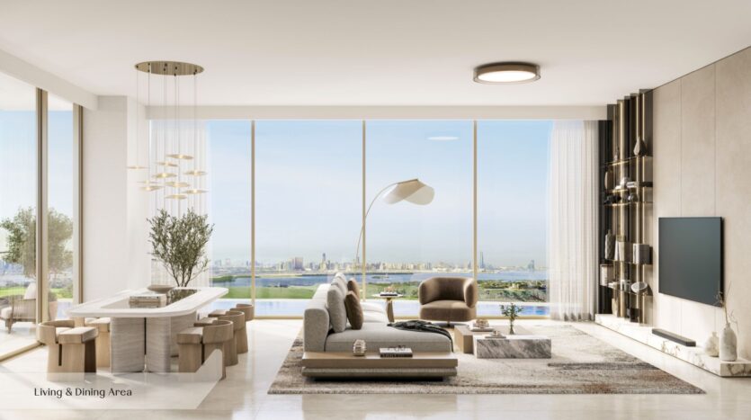 Salon et salle à manger contemporains à Everly Place by Ellington, avec de grandes baies vitrées, une vue sur les toits de la ville, un mobilier aux tons neutres, une table à manger avec des bancs, un éclairage élégant, des plantes luxuriantes et un téléviseur épuré fixé au mur. Le texte « Salon &amp; Salle à manger » figure dans un coin.