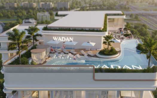La piscine à débordement du Weston by Wadan est équipée de chaises longues, de parasols, de palmiers et de personnes en train de se détendre. Le bâtiment affiche "WADAN" en grosses lettres, avec en arrière-plan des routes urbaines et une végétation luxuriante.