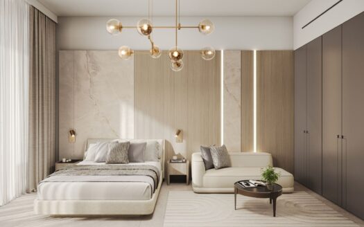 Une chambre moderne aux tons neutres, idéale pour ceux qui souhaitent investir dans un studio à Dubaï, comprenant un grand lit, un canapé beige, des armoires encastrées, une décoration minimaliste, une table basse ronde, de grandes fenêtres ornées de voilages et un lustre contemporain doré.