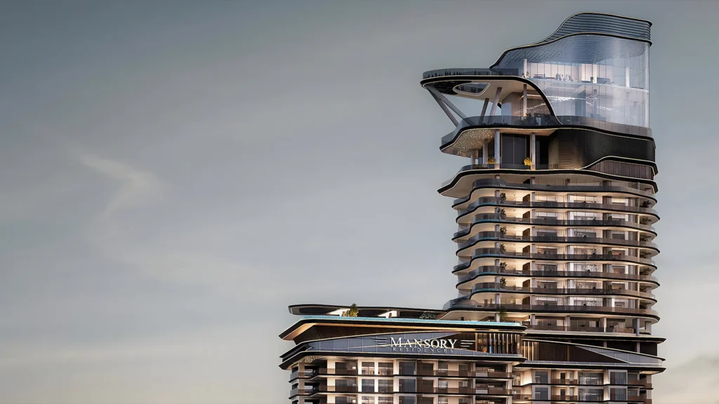 Un gratte-ciel moderne à l'architecture courbée et futuriste, doté de grandes baies vitrées, de balcons et de terrasses. Une enseigne indiquant « Mansory Residences » est visible à un certain étage — l'endroit idéal pour les investisseurs en quête de luxe sous le ciel dégagé de la ville.