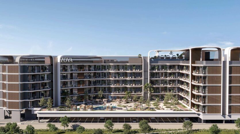 Un immeuble moderne de plusieurs étages portant le nom de « ZOYA » se distingue par ses balcons, ses grandes baies vitrées, ses espaces verts sur le toit et sa cour paysagée dotée d’une piscine et de coins détente sous un ciel dégagé — un cadre accueillant qui rappelle l’élégance sereine du Mirari Lagoon by Zoya.