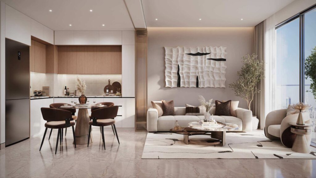 Cuisine et salon modernes en espace ouvert, décorés dans des tons beiges, avec un sol en marbre, une table à manger pour quatre personnes, un canapé blanc, des œuvres d'art abstraites inspirées de « Mirari Lagoon » de Zoya, et de grandes fenêtres laissant entrer la lumière naturelle.