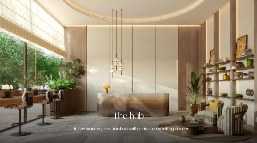 Hall de coworking moderne aux tons neutres, avec un mobilier élégant, des plantes, de grandes baies vitrées et un comptoir d'accueil central. Le texte indique : « The Hub at The Canopies by Aldar. Un espace de coworking doté de salles de réunion privées. ».