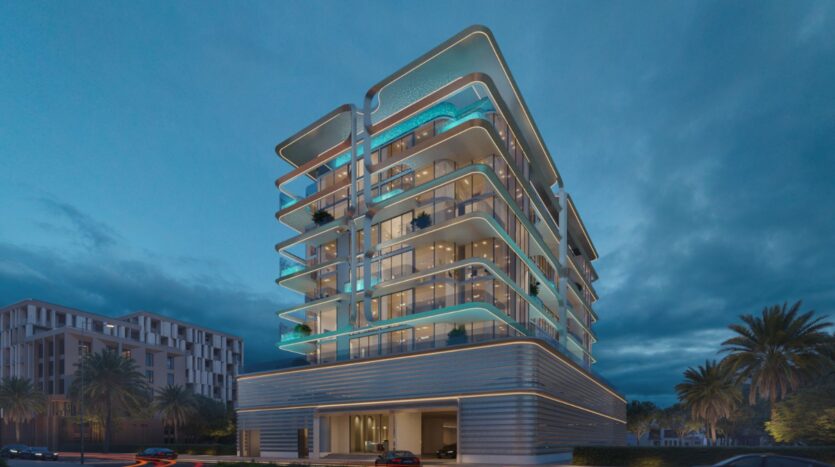 « Vue Dorée », un immeuble moderne de plusieurs étages, avec ses lumières d'accentuation bleues et ses balcons incurvés, se détache sur un ciel crépusculaire, entouré de palmiers et d'immeubles voisins.